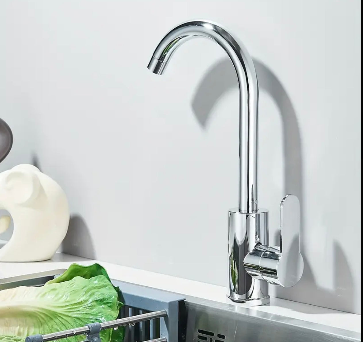 Polished chrome kitchen tap