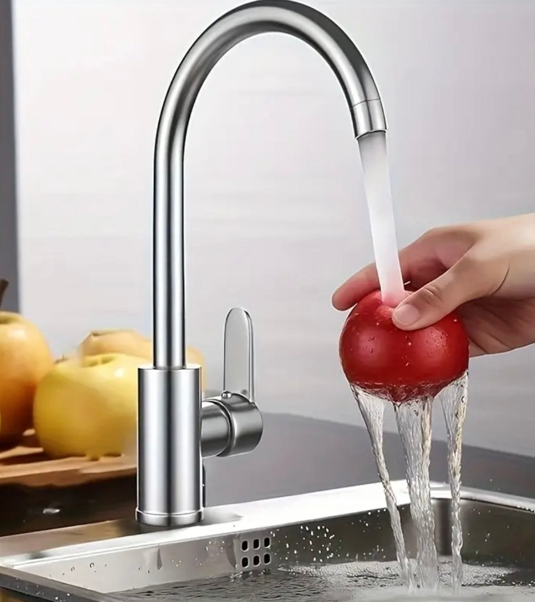 Polished chrome kitchen tap