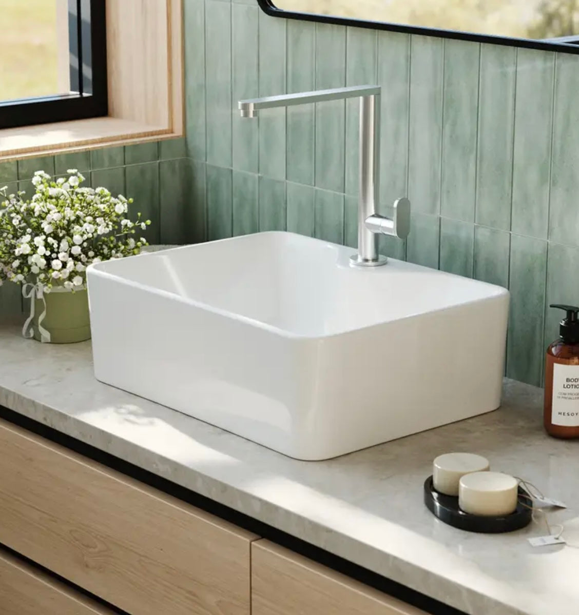 Modern countertop mounted sink for cloakroom or washroom
