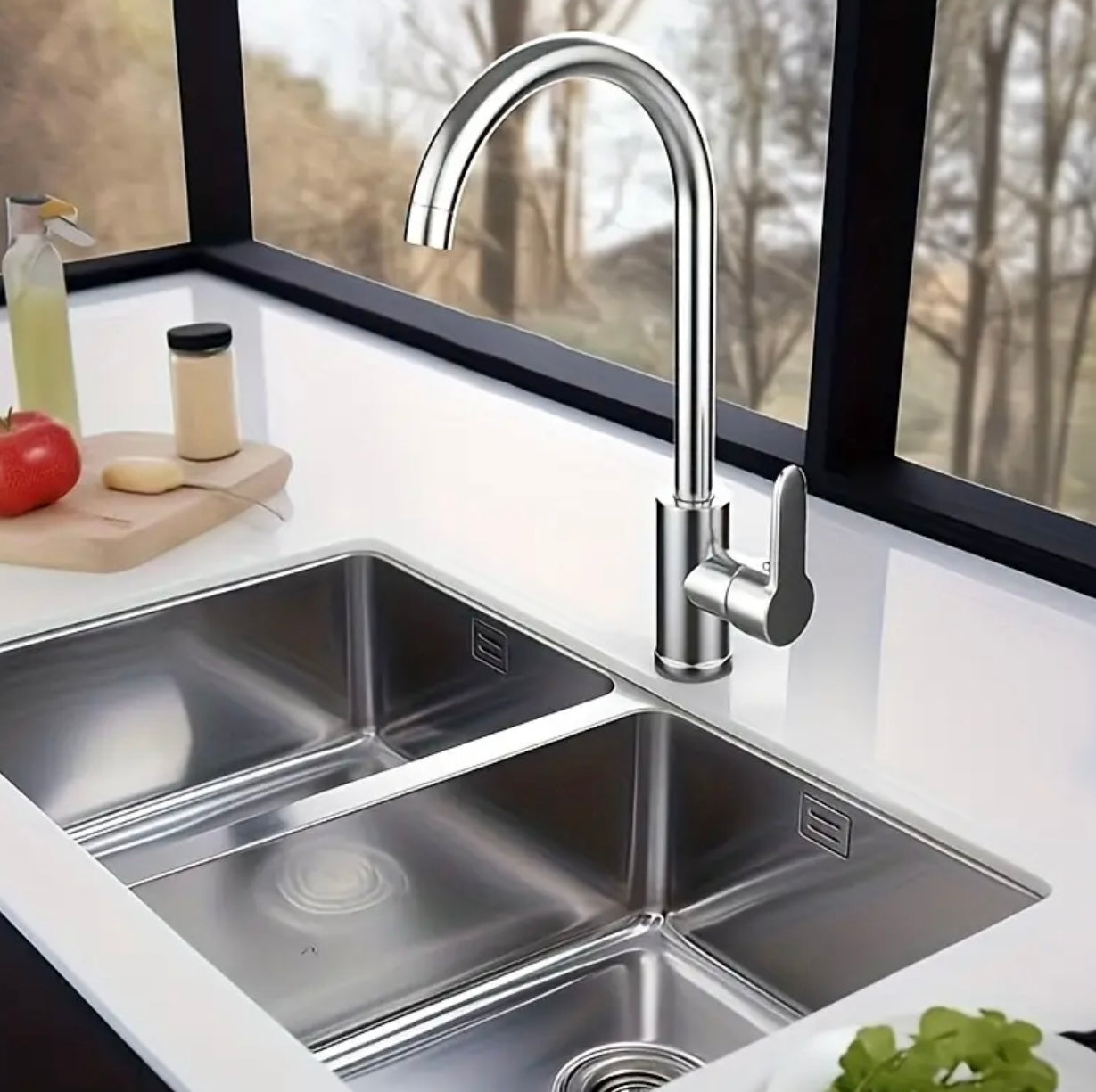 Polished chrome kitchen tap