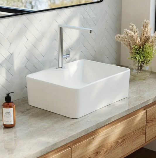 Modern countertop mounted sink for cloakroom or washroom